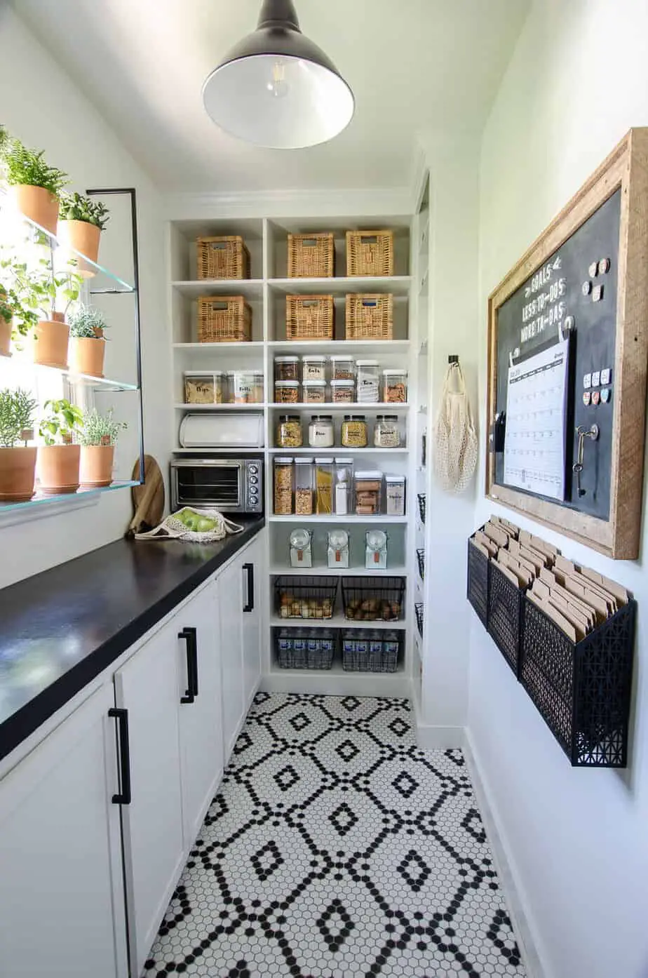 https://www.simplicityinthesouth.com/wp-content/uploads/2019/05/narrow-walk-in-pantry-design-with-countertop-and-shelving.jpg